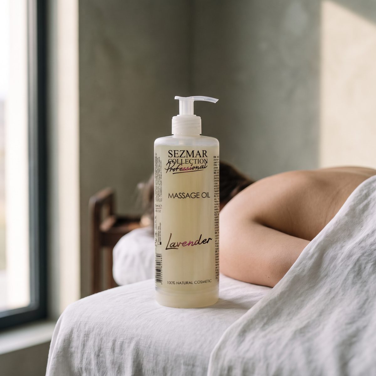 Lavender Massage Oil 500 ml on a massage couch